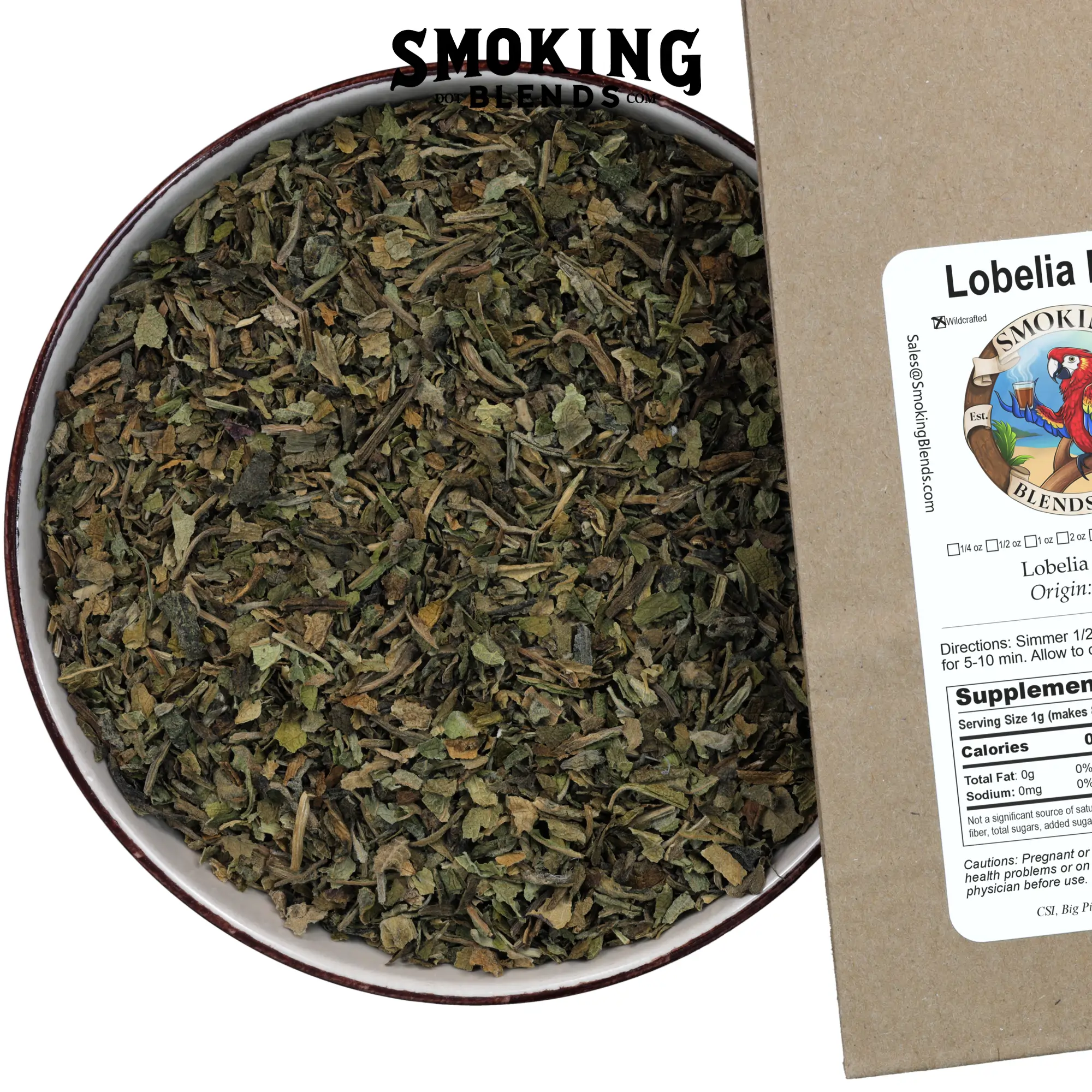 A detailed close-up shot focusing on the texture of dried, cut Lobelia leaves overflowing from a ceramic bowl. The edge of the SmokingBlends.com kraft paper product label is visible on the right side of the frame.