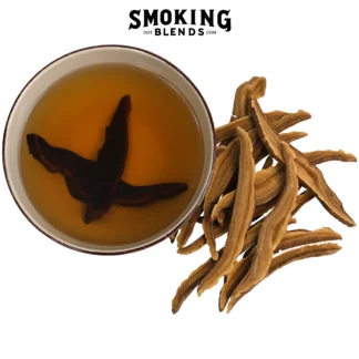 Dried Reishi mushroom slices (Ganoderma lucidum) piled next to a brewed cup of herbal Reishi tea in a ceramic bowl.