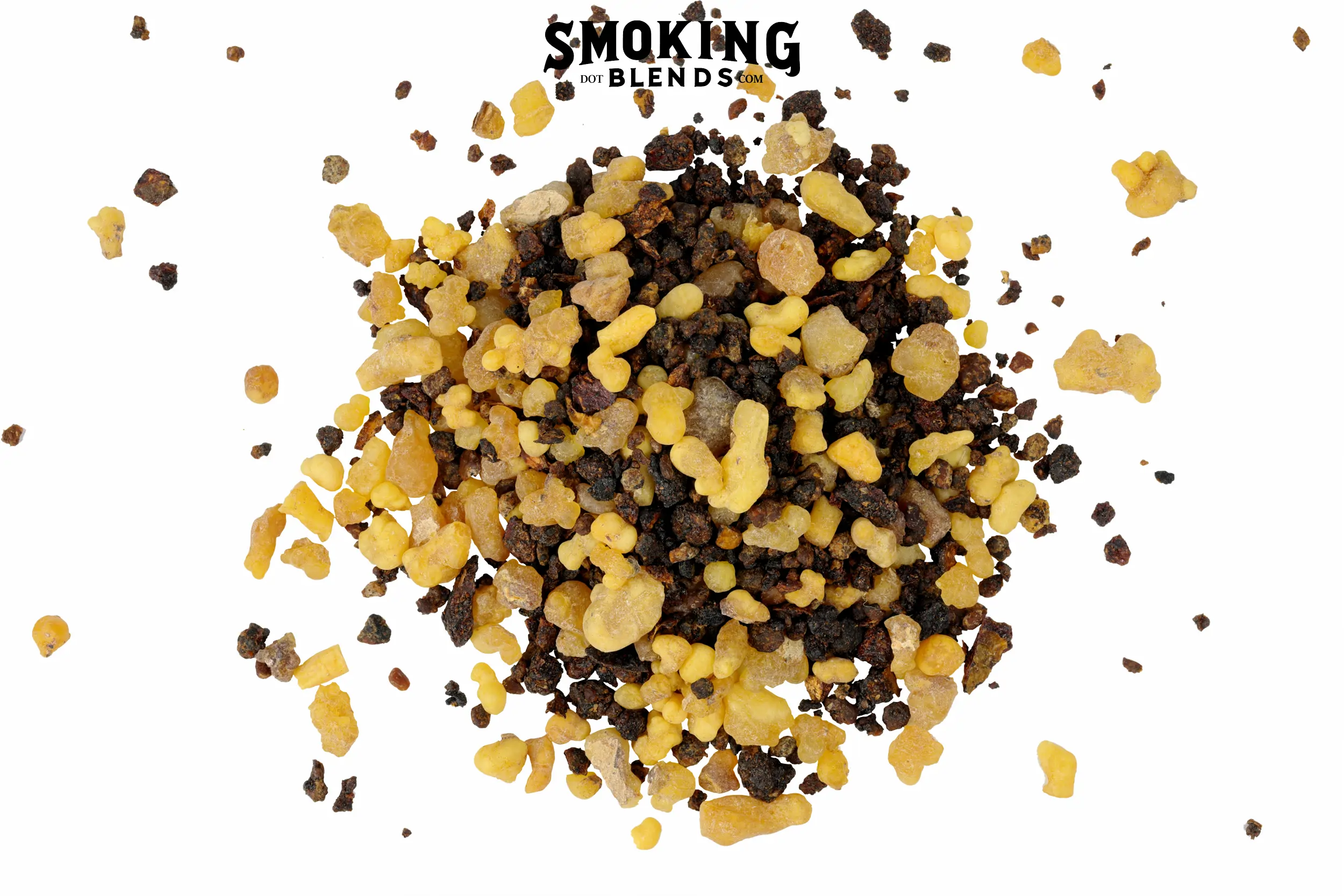 The image shows a scattered pile of frankincense and myrrh resin pieces of various sizes.
