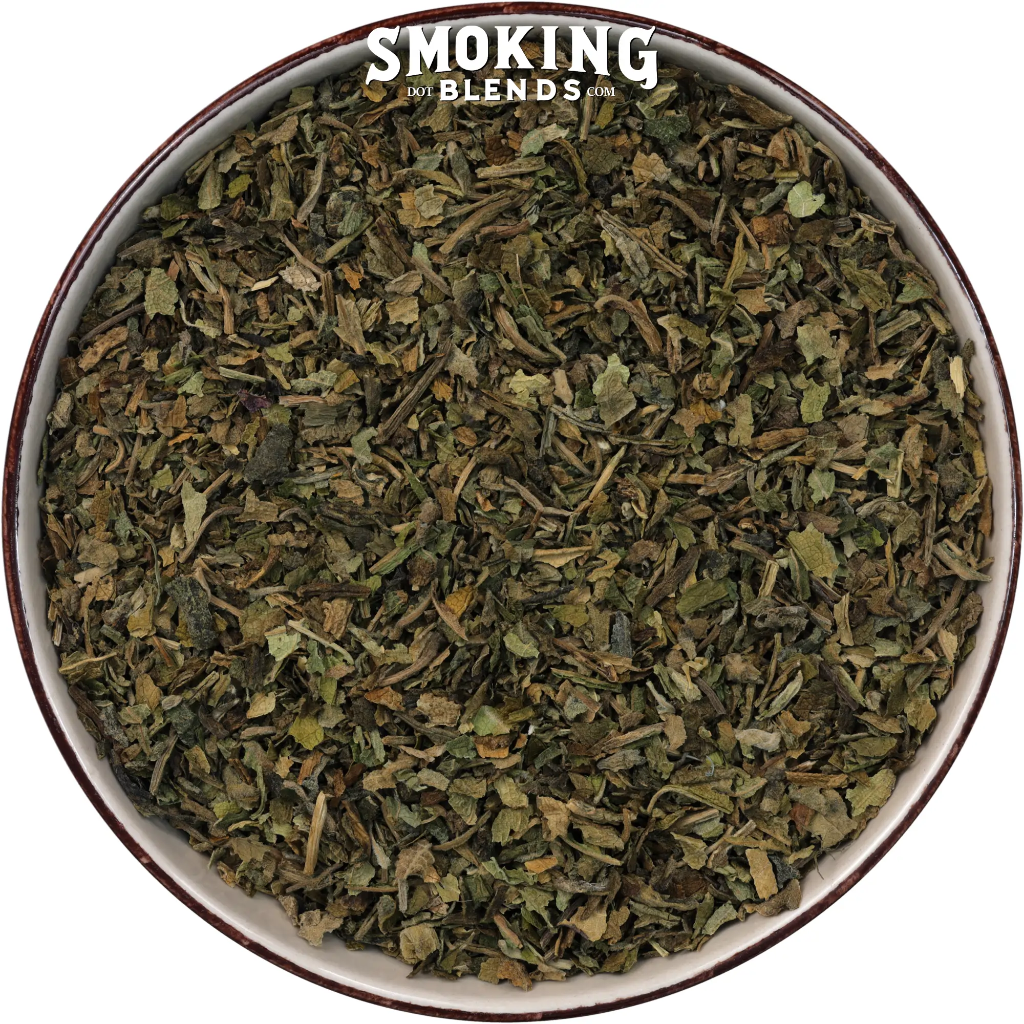 Direct overhead photograph looking into a bowl filled with loose, dried dark and light green Lobelia leaves. The SmokingBlends.com logo watermark is visible at the top center of the frame.