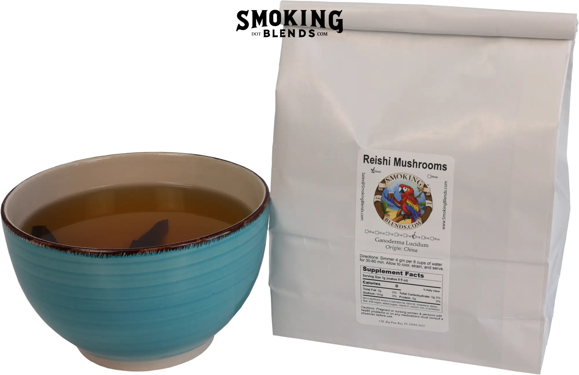 SmokingBlends.com Reishi Mushroom product packaging standing next to a blue bowl of hot tea containing a mushroom slice.